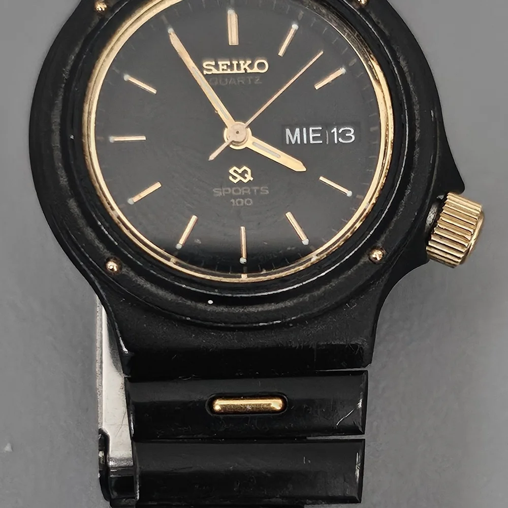 Seiko Black and Gold Quartz Sports Watch